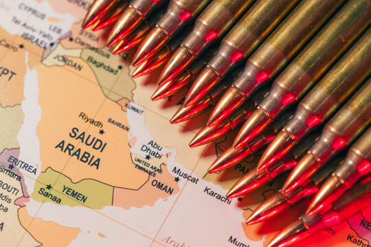 bullets standing over a world map as a conceptual metaphor for global geopolitical conflict war crisis between Ukraine, Russia, Iran, Israel, China, Taiwan, Japan, and USA in Strait of Hormuz