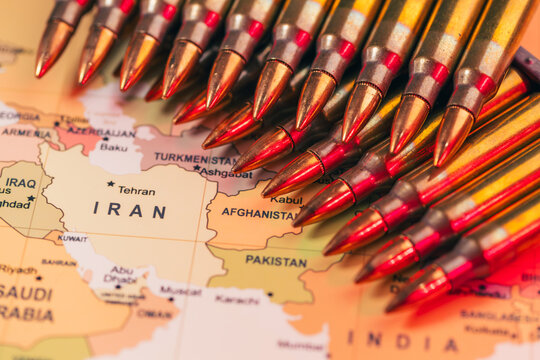 bullets standing over a world map as a conceptual metaphor for global geopolitical conflict war crisis between Ukraine, Russia, Iran, Israel, China, Taiwan, Japan, and USA in Strait of Hormuz