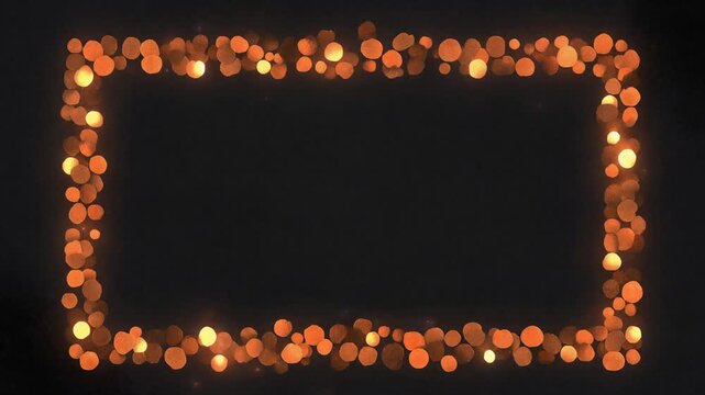 黒背景に橙色と金色の玉ボケが縁取る華やかな矩形フレームの動画素材
