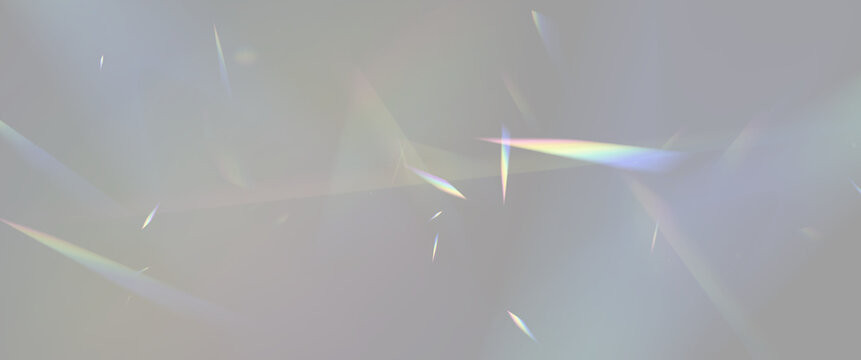 Scattered multicolored light refractions with sharp angular shapes on a dark background on transparent background