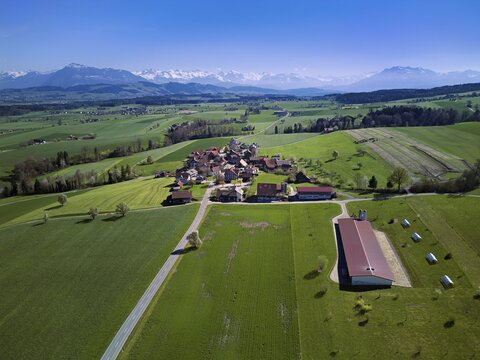 View of the hamlet of Alikon, with the Alps with the Rigi and Pilatus in the back, Sins, Freiamt, Aargau Canton, Switzerland