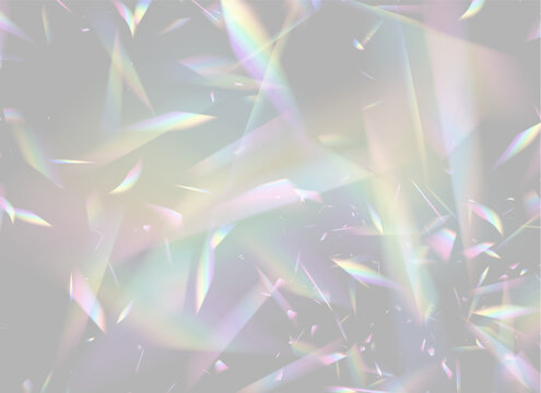 Multicolored triangular light shards scattered dynamically over a dark background on transparent background