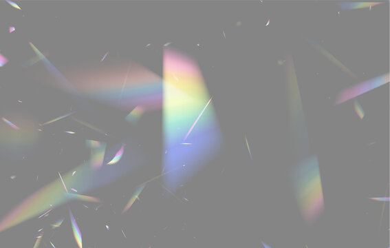 Scattered fragments of multicolored light beams on a deep black background creating a prism effect on transparent background