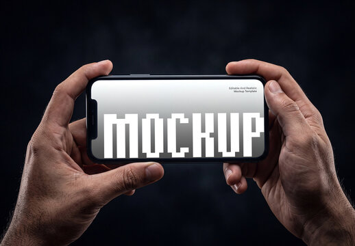 Two Hands Holding Mobile Phone Mockup in Landscape Mode on Dark Background