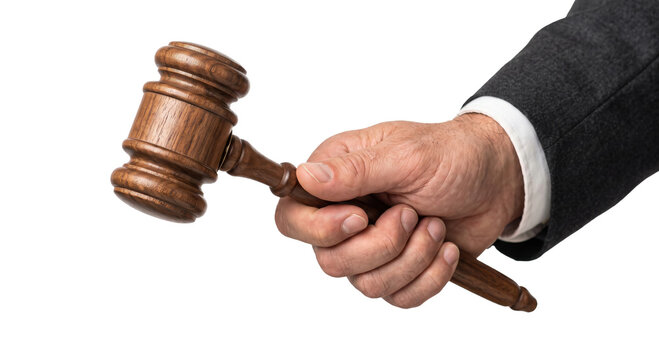 Judge holding a wooden gavel in a courtroom, symbolizing justice and legal decisions