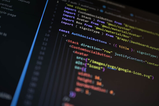 Close-up of authentication interface source code on a computer monitor with colorful syntax highlighting, illustrating secure login, web programming, cybersecurity and digital technology.