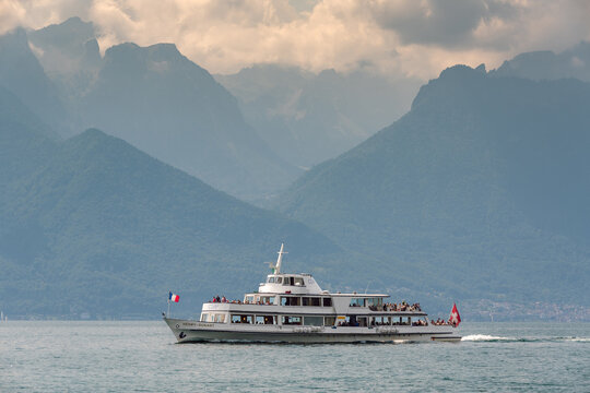 Passenger Ferry Henry-Dunant Navigating Lake Geneva Against Alpine Peaks
