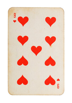 Old vintage Nine of Hearts playing card isolated on white.