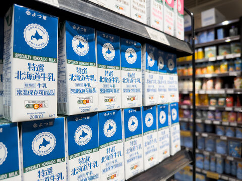 PENANG, MALAYSIA - MAY 25, 2026: Yotsuba Hokkaido milk cartons displayed on supermarket retail shelf.