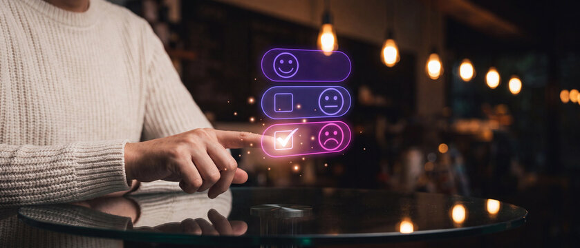 Customer experience feedback concept, person hand touching digital screen with sad face icon to rate service quality
