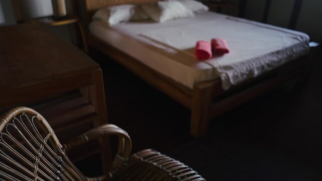 A warm room in a tropical house featuring abundant wood and items made of straw, iraca, and fique