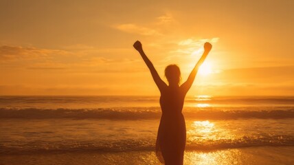 Fototapeta premium Successful woman silhouette at sunset beach, triumphant female figure with raised arms on ocean shore, golden hour freedom and achievement concept