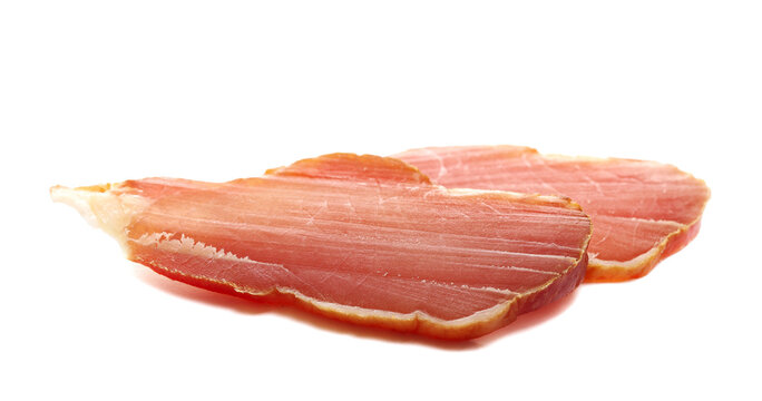 Traditional cured meat, smoked slices isolated on white background, side view