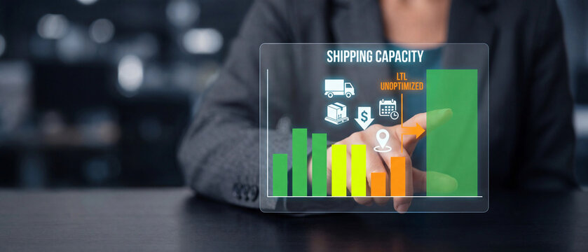 Business person touching digital screen showing shipping capacity graph with ltl unoptimized logistics concept