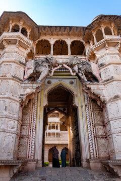 India. Rajasthan. Bundi. Garh Palace. The Elephant Gate (Hathi Pol), the palace&rsquo;s monumental entrance adorned with two carved elephants with intertwined trunks
