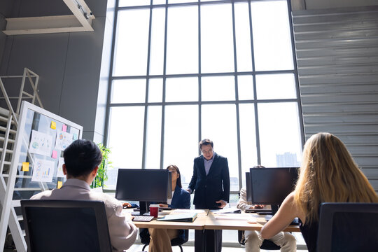 Busy day, Corporate business people working in busy marketing office space,  Businessman, businesswoman and workers at creative co-working space