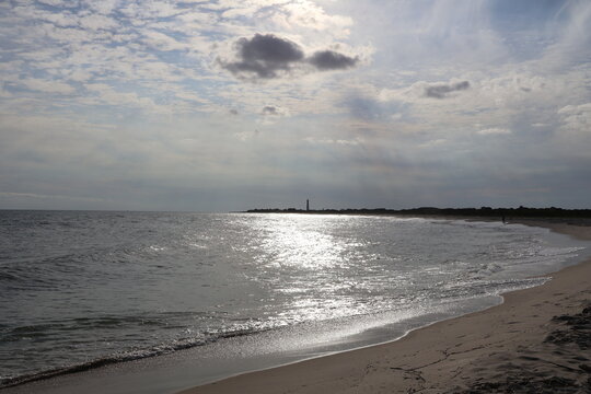 Transcendent cloud formation under the heat of a midday sun rolling over the coast of the Cape May Cove.