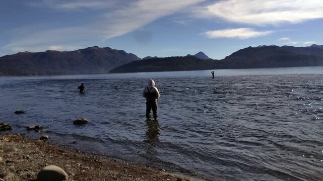 Fly Fisherman Wading in Lake Correntoso Near Nahuel Huapi in Patagonia Argentina