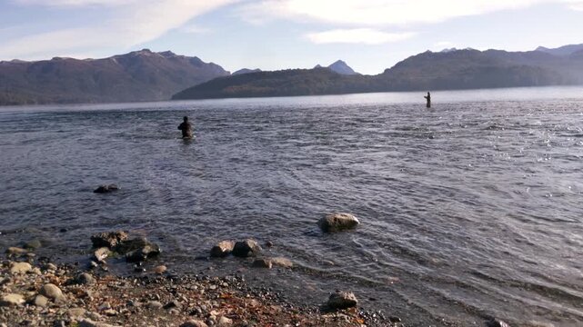 Several Fishermen Practicing Sport Fishing in Lake Correntoso, Patagonia Argentina