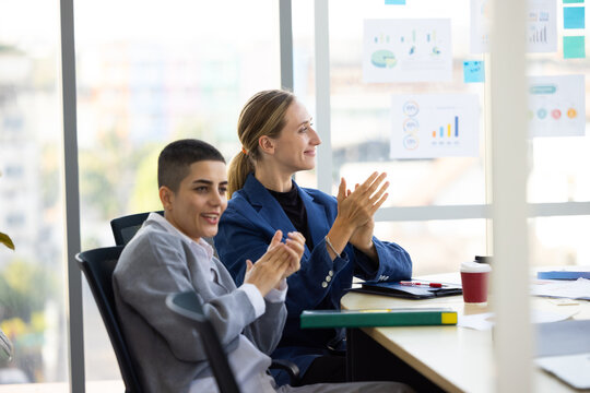 Young short hair business woman entrepreneur and diverst people colleague meeting together at board room. diverse businesspeople. Unity and teamwork. corporate business meeting. Skinhead