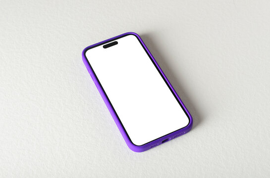 Mockup phone with a blank white screen and purple frame lies diagonally on a plain grey background.