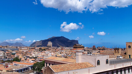 Obraz premium Panoramic rooftop view over historic city roofs and Monte Pellegrino in Palermo, Sicily, Italy