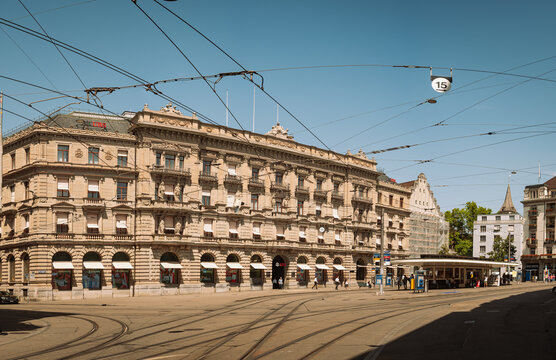 Zurich, Switzerland, August 4, 2026. Wide view of historic UBS building and tram tracks at Paradeplatz in financial district.