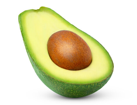 Cut in a half of fuerte avocado with seed isolated.