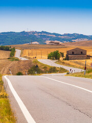 Fototapeta premium Italia, Toscana, Siena, la campagna senese in estate.