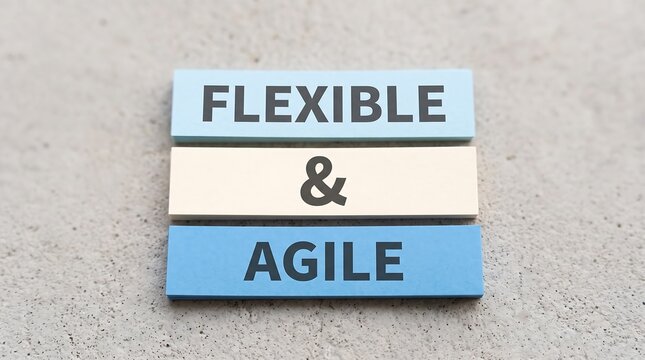 Flexible and agile business concept on wooden blocks, blue and white wooden bricks with text, corporate strategy and adaptability metaphor