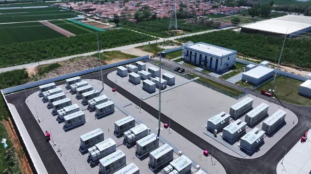 Aerial view of large-scale energy storage power station with battery array modules