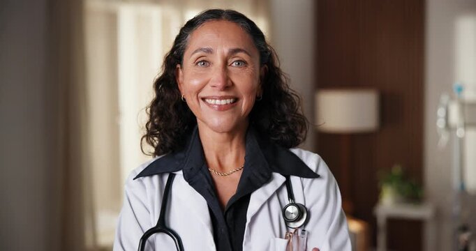 Face, doctor and woman in hospital with smile, knowledge and experience for healthcare management. Happy, mature person and manager in clinic with medical expertise, positive attitude and wellness.