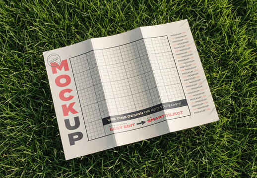 Open Flyer Outside Brochure Mockup on Green Grass