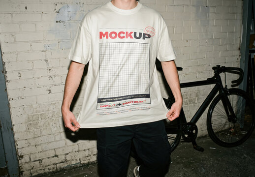 Person Pulling Over Sized Tshirt Design Hard Flash Mockup