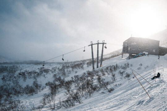 Snowy Ski Lift and Mountain Slope in Winter