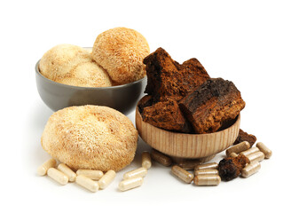 Different functional mushrooms and pills isolated on white © New Africa