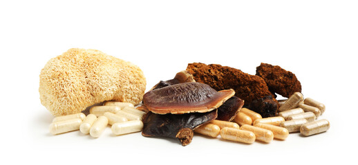 Different functional mushrooms and pills isolated on white © New Africa