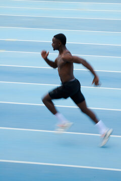 Motion blur photo of man running