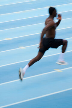 Motion blur photo of man running