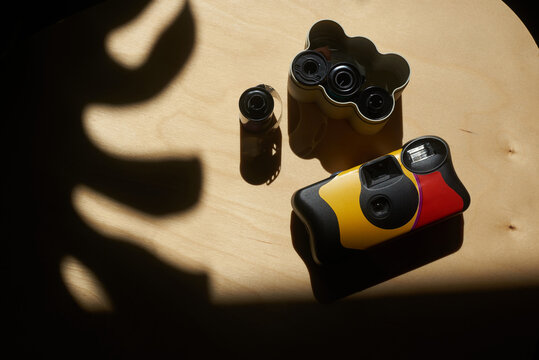 Disposable camera and case for film