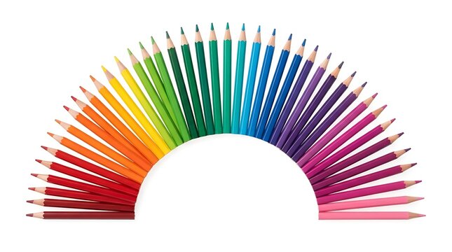 Colorful pencils arranged in a semicircle on a white background