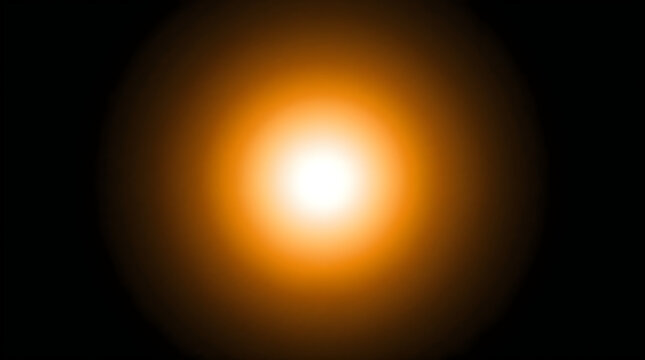 Bright orange light glow in dark background with lens flare effect