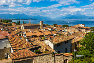 Obraz premium Panoramic view of the historic center of Desenzano del Garda and Lake Garda from the castle