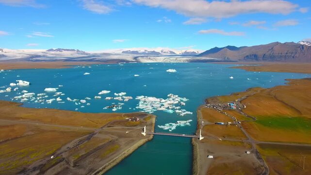 Glacier melting and icebergs floating in a lagoon as a consequence of extreme temperature rise, a result of the climate crisis.