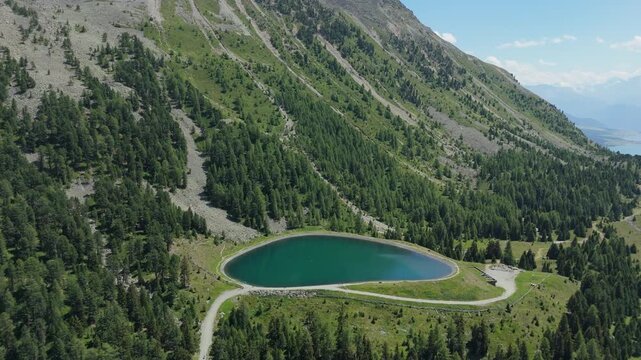 Drone Pull Back Over Speichersee Alpine Reservoir Near Nauders Austria