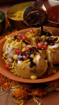 Dahi puri or dahi batashe an indian sweet,tangy and spicy snack