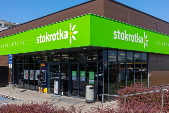 Warsaw, Masovian Voivodeship, Poland - July 17, 2026: Exterior view of a modern Stokrotka supermarket building on a sunny clear summer day.