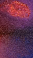 Mixing bright colors with alcohol ink in a creative art process © Mari Dein