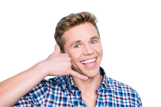 People person leisure manager call center help listen concept. Close up portrait of excited surprised astonished wondered amazed handsome guy making call me gesture isolated on gray background