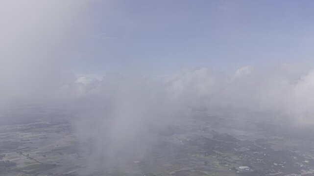 Cinematic High Altitude Aerial View of Countryside with Clouds Moving Across the Sky